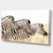 Designart - Zebras in A Row in Grassland - African Wall Art Print